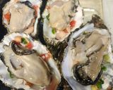 A picture of step 4 of Brad's Ceviche Oyster Rockefeller.