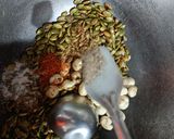 A picture of step 4 of Masala Roasted Pumpkin Seeds.