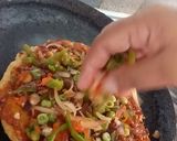 A picture of step 4 of Oats veg pizza.
