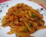 A picture of step 9 of Orange flavoured chips masala.