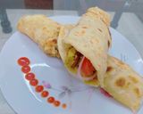A picture of step 6 of Chicken paratha roll.