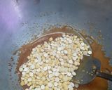 A picture of step 4 of Daliya Chikki (Roasted gram brittles).