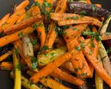 A picture of step 5 of Roasted Carrots with Thyme, Oregano, and Parsley.