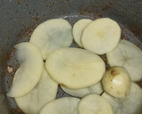 Foto del paso 3 de la receta: Bisteces de puerco con papas estilo Yucateco