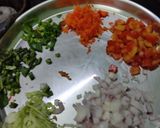 A picture of step 1 of Tomato onion rice for lunch.