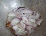 A picture of step 4 of Katla fish biryani in electric rice cooker.