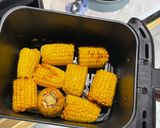 A picture of step 3 of Air fryer corn on the cob.