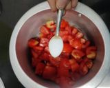 A picture of step 1 of Tomato Soup with sauteed garlic vegetables.