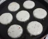 A picture of step 2 of Skewered Kuzhi Paniyaram.