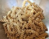 A picture of step 4 of My Smoked Sausage and smoked cheese Pasta.😊.