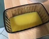 Une image de l'étape 5 de Charlotte aux abricots, orange et manzana.