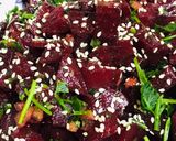 A picture of step 2 of Mediterranean beet salad with dash of roasted walnuts.