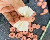 A picture of step 4 of Cheesy Ribbon sausages.