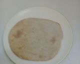 A picture of step 14 of Home made pizza with vegetables n cheese toppings.
