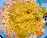 Une image de l'étape 3 de Avocat farci à la salade de scampis, surimi et mangue.