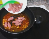 Foto del paso 2 de la receta: Salchichas con arroz