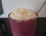 A picture of step 3 of My mixed berry slushy with cream on top.