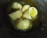 A picture of step 1 of Bengali murgir jhol (chicken gravy).