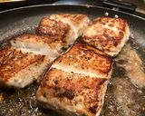 A picture of step 1 of Wild halibut with lemon honey butter caper sauce and succotash.