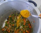 A picture of step 3 of Veg pulao in pressure cooker Indian recipe.