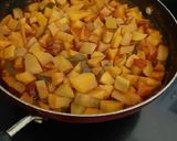 A picture of step 4 of Kerala mango pickle.