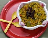 A picture of step 6 of Singapori Veg fried rice.