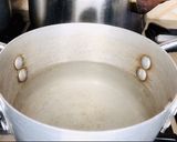 A picture of step 1 of Cheesy lamb and potatoes kupta.