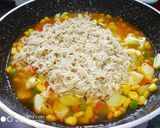 A picture of step 4 of Brown Rice with lots of veggis.