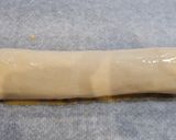 A picture of step 4 of Puff Pastry Roll Filled with Marinated Pork Loin and Cheese.