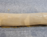 Foto del paso 4 de la receta: Brazo de gitano de hojaldre relleno de lomo adobado y queso