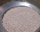 A picture of step 1 of White til and groundnut ladoo.