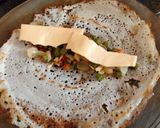 A picture of step 4 of Crispy Cheese and mix veg.masala Dosa.