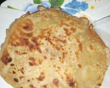 A picture of step 2 of Wrap n roll(chapati and omelette).