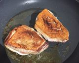 A picture of step 2 of Seared duck breasts in honey, soy and ginger.