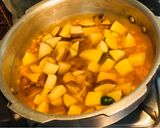 A picture of step 9 of Kolkata Style: Hinger Kochuri or Hing Kachoris with Hing-Potato Curry.