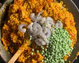 A picture of step 12 of Paella, chicken, chorizo & prawns.