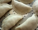 A picture of step 10 of Pitha (Bengali Coconut-Stuffed Pitha).