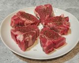 A picture of step 1 of Pan Fried Lemon and Garlic Lamb Chops.