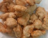 A picture of step 4 of Orange Chicken with fried rice.