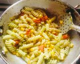 A picture of step 5 of CREAMY PESTO PASTA 😋 With BASIL Leaves.
