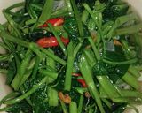 A picture of step 5 of Stir-Fried Water Spinach.