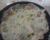 A picture of step 2 of Crispy rava dosai.