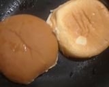 A picture of step 2 of 15 Cent Diner Fried Egg Sandwich with cheese.