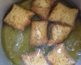 A picture of step 12 of Cardamon Mandazi.