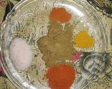 A picture of step 1 of Chicken 65.