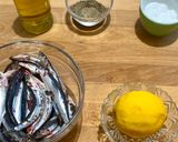 A picture of step 1 of Microwave Marinated Anchovies with Olive Oil, Lemon, Salt, and Pepper.