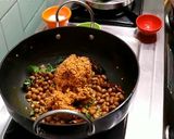 A picture of step 4 of Kaisasive chitranna / coconut mustard rice.