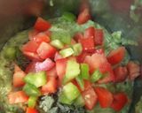 A picture of step 4 of Zucchini stuffed with cheesy Guacamole.