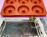 A picture of step 4 of No knead baked donuts with 2 different glaze.