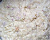 A picture of step 6 of Bread sauce with onion.